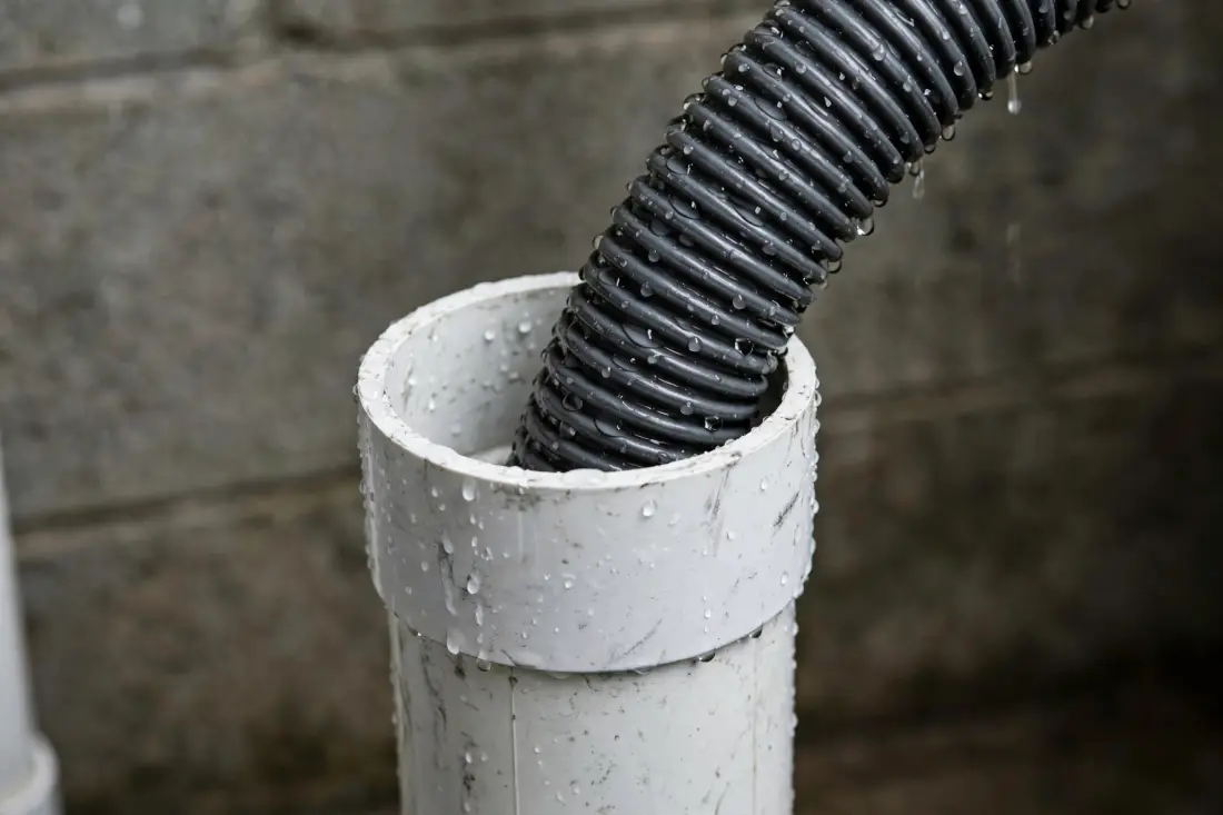 Washing machine drain hose in a laundry standpipe
